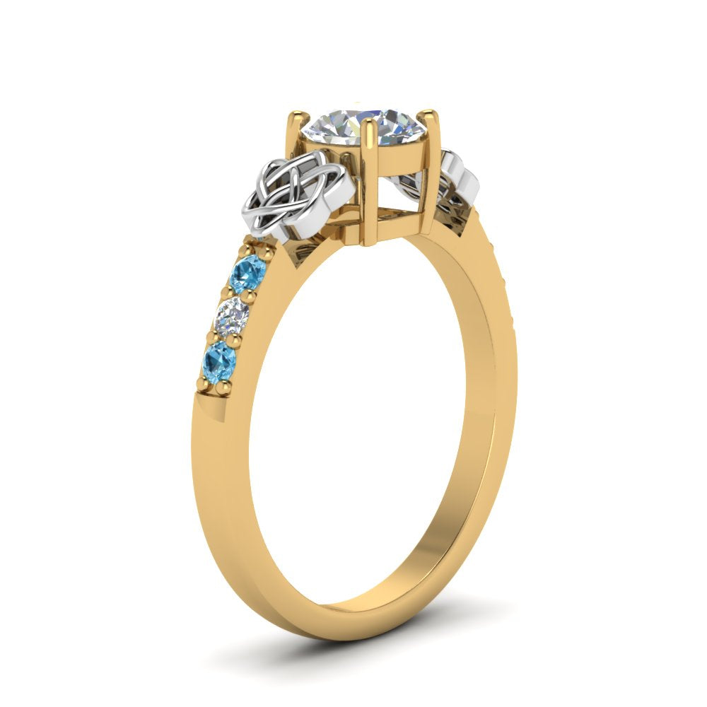 round-cut-celtic-diamond-ring-with-blue-topaz-in-14K-yellow-gold-FDENS2255RORGICBLTOANGLE2-NL-YG