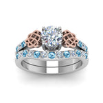 Load image into Gallery viewer, round-cut-celtic-diamond-wedding-ring-set-with-blue-topaz-in-14K-white-gold-FDENS2255B1ROGICBLTOANGLE5-NL-WG_db6efea6-a4c6-44c5-8cba-b9adff076cc9?v=1757057012
