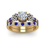 Load image into Gallery viewer, round-cut-celtic-diamond-wedding-ring-set-with-sapphire-in-14K-yellow-gold-FDENS2255B1ROGSABLANGLE5-NL-YG_8df7b75a-4d17-48c4-8c6e-02edc279fe75?v=1757057012
