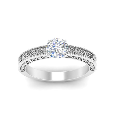 round-cut-celtic-engraved-solitaire-ring-in-white-gold-fdenr8544rorangle5-nl-wg