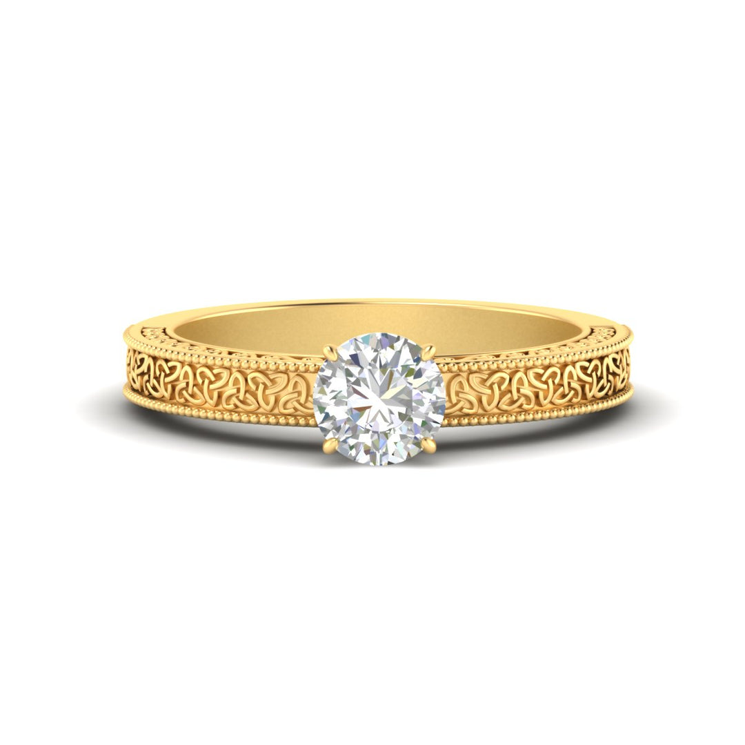 round-cut-celtic-engraved-solitaire-ring-in-yellow-gold-fdenr8544rorsleep-nl-yg