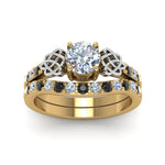 Load image into Gallery viewer, round-cut-celtic-wedding-ring-set-with-black-diamond-in-14K-yellow-gold-FDENS2255B1ROGBLACKANGLE5-NL-YG_75064a58-fd78-4964-a3cb-4cb458afebd8?v=1757057011

