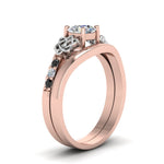Load image into Gallery viewer, round-cut-celtic-wedding-set-with-black-diamond-in-14K-rose-gold-FDENS2255B3ROGBLACKANGLE2-NL-RG_51681e1a-225e-4c11-8e37-bfa6c77c4d1a?v=1756976864
