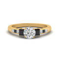Thumbnail 63 - round-cut-channel-three-stone-diamond-engagement-ring-with-black-diamond-in-yellow-gold-FDENS205RORGBLACK-NL-YG.jpg
