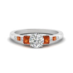 Load image into Gallery viewer, round-cut-channel-three-stone-diamond-engagement-ring-with-orange-sapphire-in-white-gold-FDENS205RORGSAOR-NL-WG.jpg
