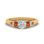 Load image into Gallery viewer, round-cut-channel-three-stone-diamond-engagement-ring-with-orange-sapphire-in-yellow-gold-FDENS205RORGSAOR-NL-YG.jpg
