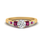 Load image into Gallery viewer, round-cut-channel-three-stone-diamond-engagement-ring-with-pink-sapphire-in-yellow-gold-FDENS205RORGSADRPI-NL-YG.jpg
