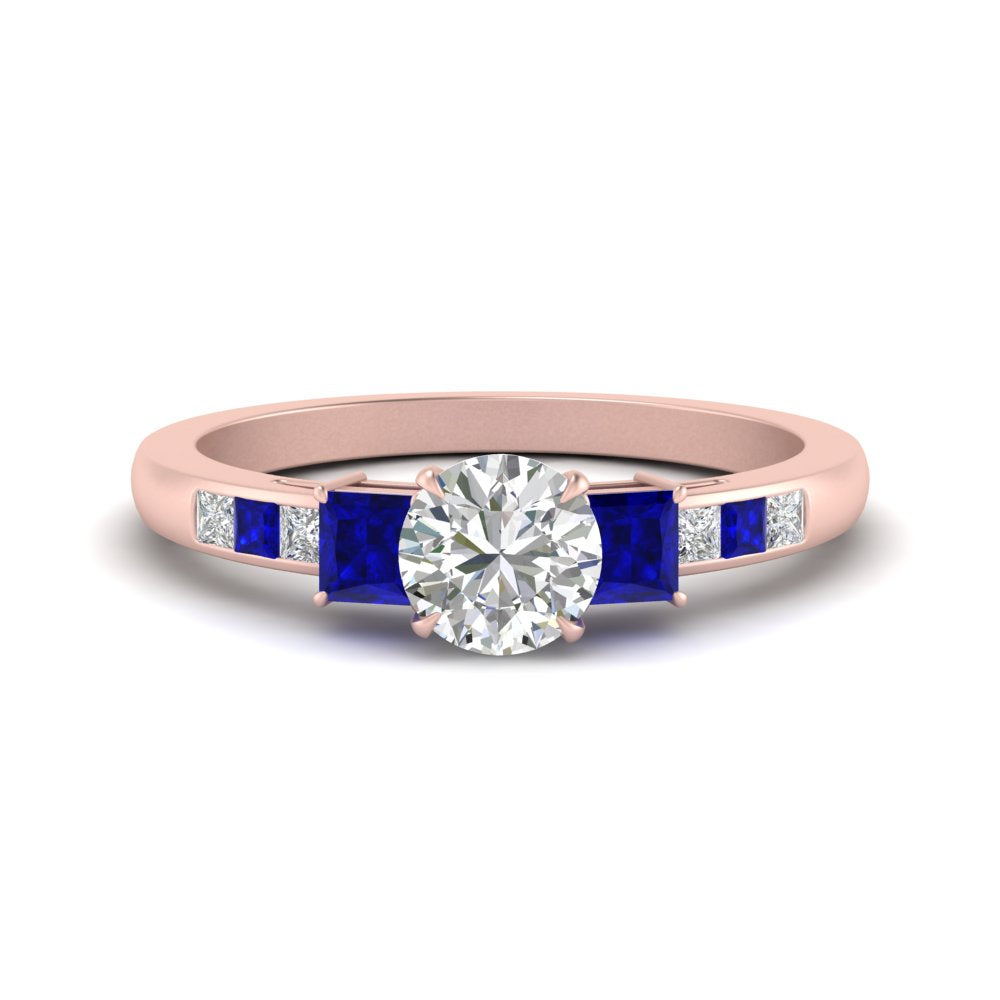 round-cut-channel-three-stone-diamond-engagement-ring-with-sapphire-in-rose-gold-FDENS205RORGSABL-NL-RG.jpg