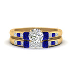 Load image into Gallery viewer, round-cut-channel-three-stone-diamond-engagement-ring-with-sapphire-in-yellow-gold-FDENS205ROGSABL-NL-YG.jpg