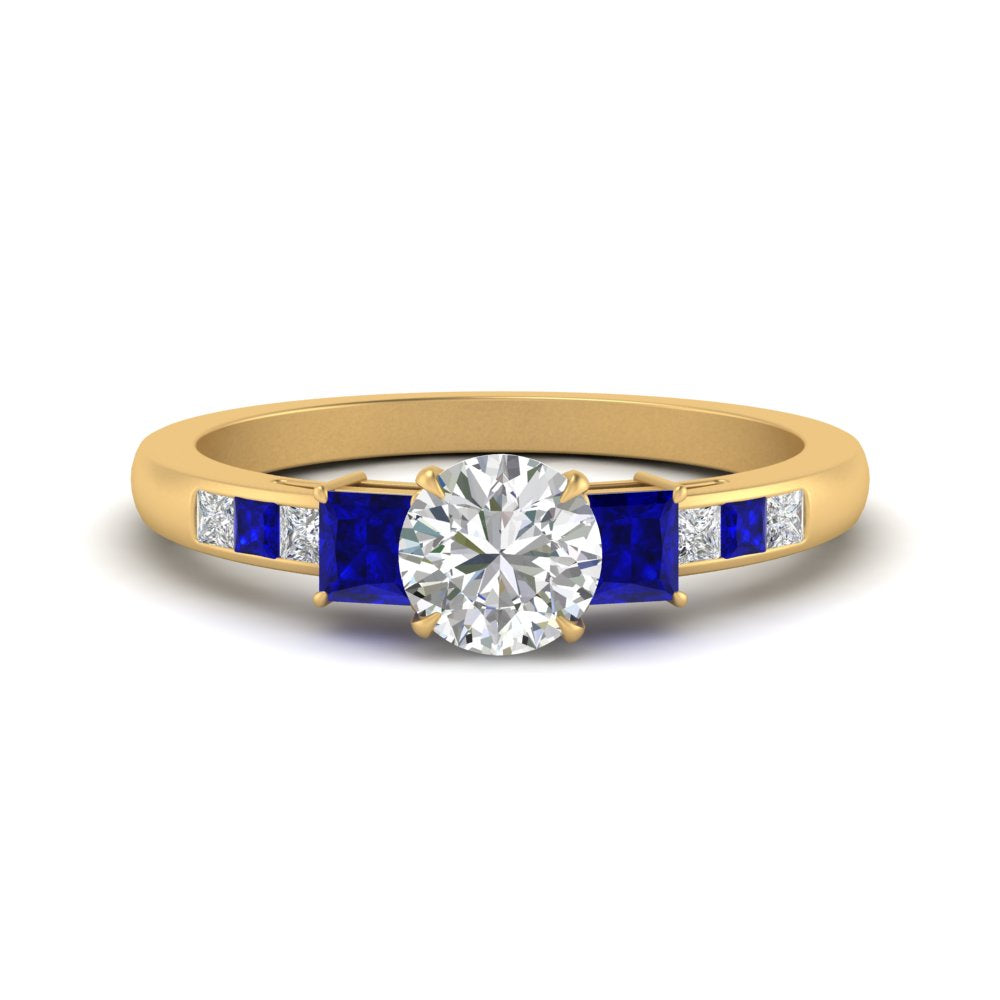 round-cut-channel-three-stone-diamond-engagement-ring-with-sapphire-in-yellow-gold-FDENS205RORGSABL-NL-YG.jpg