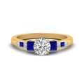 Thumbnail 19 - round-cut-channel-three-stone-diamond-engagement-ring-with-sapphire-in-yellow-gold-FDENS205RORGSABL-NL-YG.jpg