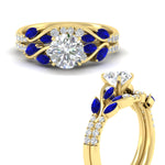 Load image into Gallery viewer, round-cut-curved-vine-sapphire-wedding-ring-set-in-yellow-gold-fdens11635rogsablangle3-nl-yg.jpg?v=1764647005