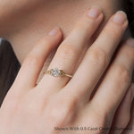 Load image into Gallery viewer, round-cut-diamond-celtic-solitaire-ring-in-yellow-gold-FD8541R-ROR-YG-HAND?v=1758624176

