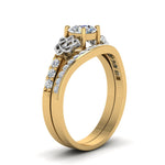 Load image into Gallery viewer, round-cut-diamond-channel-band-celtic-bridal-set-in-14K-yellow-gold-FDENS2255B2ROANGLE2-NL-YG_d70d4415-91da-4317-9a25-1cc4f6a1f79d?v=1756980510
