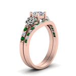 Load image into Gallery viewer, round-cut-diamond-channel-band-celtic-bridal-set-with-emerald-in-14K-rose-gold-FDENS2255B2ROGEMGRANGLE2-NL-RG_a2917cfc-0028-4bcf-8ff9-342877b30a89?v=1756980511
