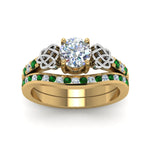 Load image into Gallery viewer, round-cut-diamond-channel-band-celtic-bridal-set-with-emerald-in-14K-yellow-gold-FDENS2255B2ROGEMGRANGLE5-NL-YG_9c0515de-f788-4d09-aff4-843b9e58c4f7?v=1756980511
