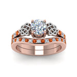 Load image into Gallery viewer, round-cut-diamond-channel-band-celtic-bridal-set-with-orange-sapphire-in-14K-rose-gold-FDENS2255B2ROGSAORANGLE5-NL-RG_75c3d79a-4d5b-44d7-9a9b-652a3775459e?v=1756980510
