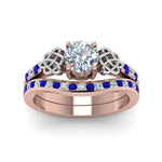 Load image into Gallery viewer, round-cut-diamond-channel-band-celtic-bridal-set-with-sapphire-in-14K-rose-gold-FDENS2255B2ROGSABLANGLE5-NL-RG_8f1da383-0073-4ef9-8111-12b88da12832?v=1756980512
