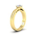 Load image into Gallery viewer, round-cut-diamond-serenity-solitaire-wedding-set-in-yellow-gold-fdens1020roangle2-nl-yg?v=1764307635