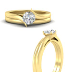 Load image into Gallery viewer, round-cut-diamond-serenity-solitaire-wedding-set-in-yellow-gold-fdens1020roangle3-nl-yg?v=1764307636