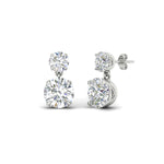 Load image into Gallery viewer, round-cut-diamond-stud-earrings-with-drop-design-in-white-gold-fdear11550roangle1-nl-wg.jpg?v=1769066477