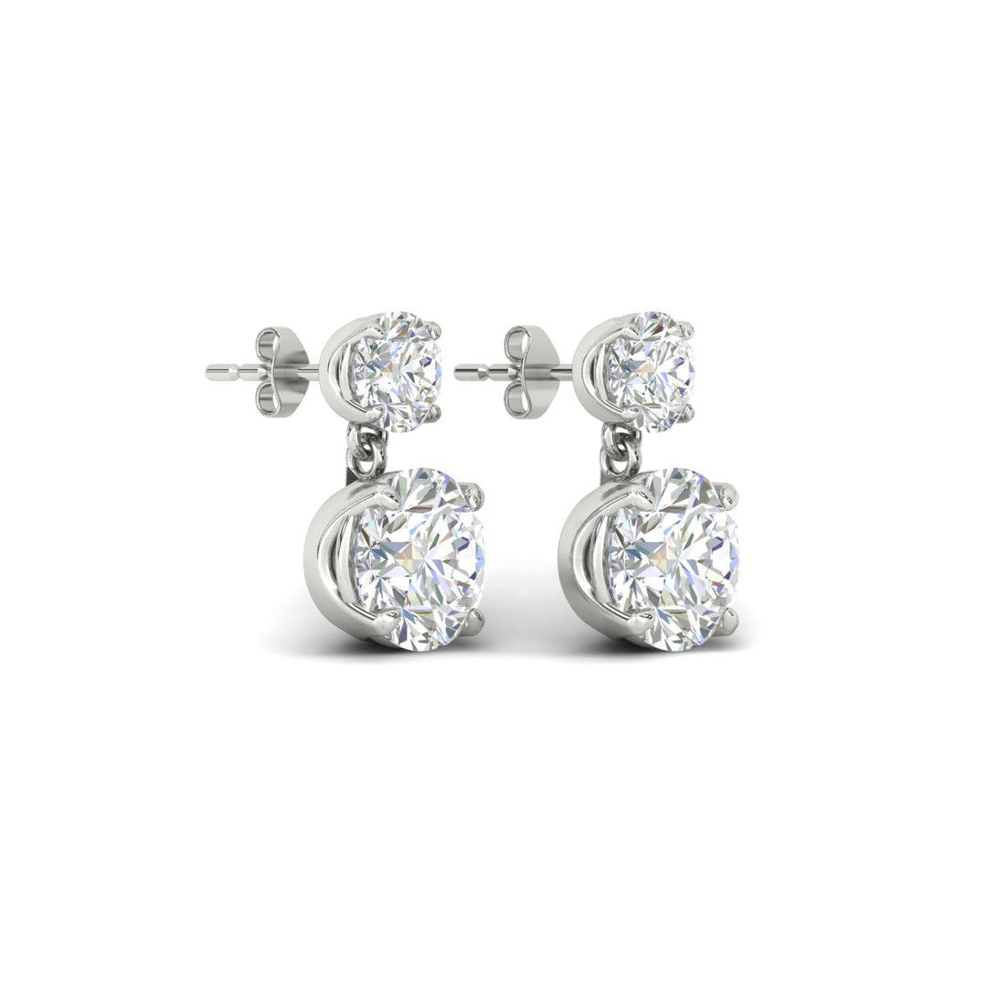 round-cut-diamond-stud-earrings-with-drop-design-in-white-gold-fdear11550roangle4-nl-wg.jpg?v=1769066477