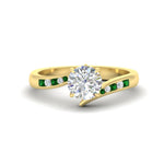 Load image into Gallery viewer, round-cut-diamond-swirl-channel-set-emerald-wedding-ring-in-yellow-gold-FDENS4028RORGEMGR-NL-YG.jpg?v=1754996008
