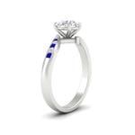 Load image into Gallery viewer, round-cut-diamond-swirl-channel-set-sapphire-wedding-ring-in-white-gold-FDENS4028RORGSABLANGLE2-NL-WG.jpg?v=1754996006
