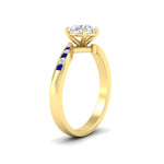 Load image into Gallery viewer, round-cut-diamond-swirl-channel-set-sapphire-wedding-ring-in-yellow-gold-FDENS4028RORGSABLANGLE2-NL-YG_d3b89e9e-43b2-43b4-aa0a-64728d2d6b1c.jpg?v=1754996176
