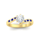 Load image into Gallery viewer, round-cut-diamond-swirl-channel-set-sapphire-wedding-ring-in-yellow-gold-FDENS4028RORGSABLANGLE5-NL-YG.jpg?v=1754996006
