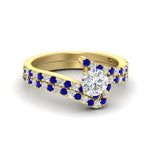 Load image into Gallery viewer, round-cut-diamond-wedding-ring-set-with-sapphire-in-FDENS3007ROGSABL-NL-YG
