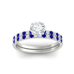 Load image into Gallery viewer, round-cut-french-pave-sapphire-wedding-ring-set-in-white-gold-FD11408ROGSABLANGLE5-NL-WG_fd7a45df-bedf-4c65-9b6a-90982d0d9983?v=1763104469
