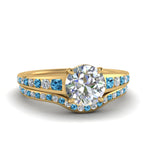 Load image into Gallery viewer, round-cut-graduated-channel-diamond-wedding-set-with-blue-topaz-in-FD122866ROGICBLTO-NL-YG
