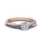 Load image into Gallery viewer, round-cut-infinity-twist-diamond-engagement-ring-with-ice-blue-topaz-in-14K-rose-gold-FD8253RORGICBLTO-NL-RG
