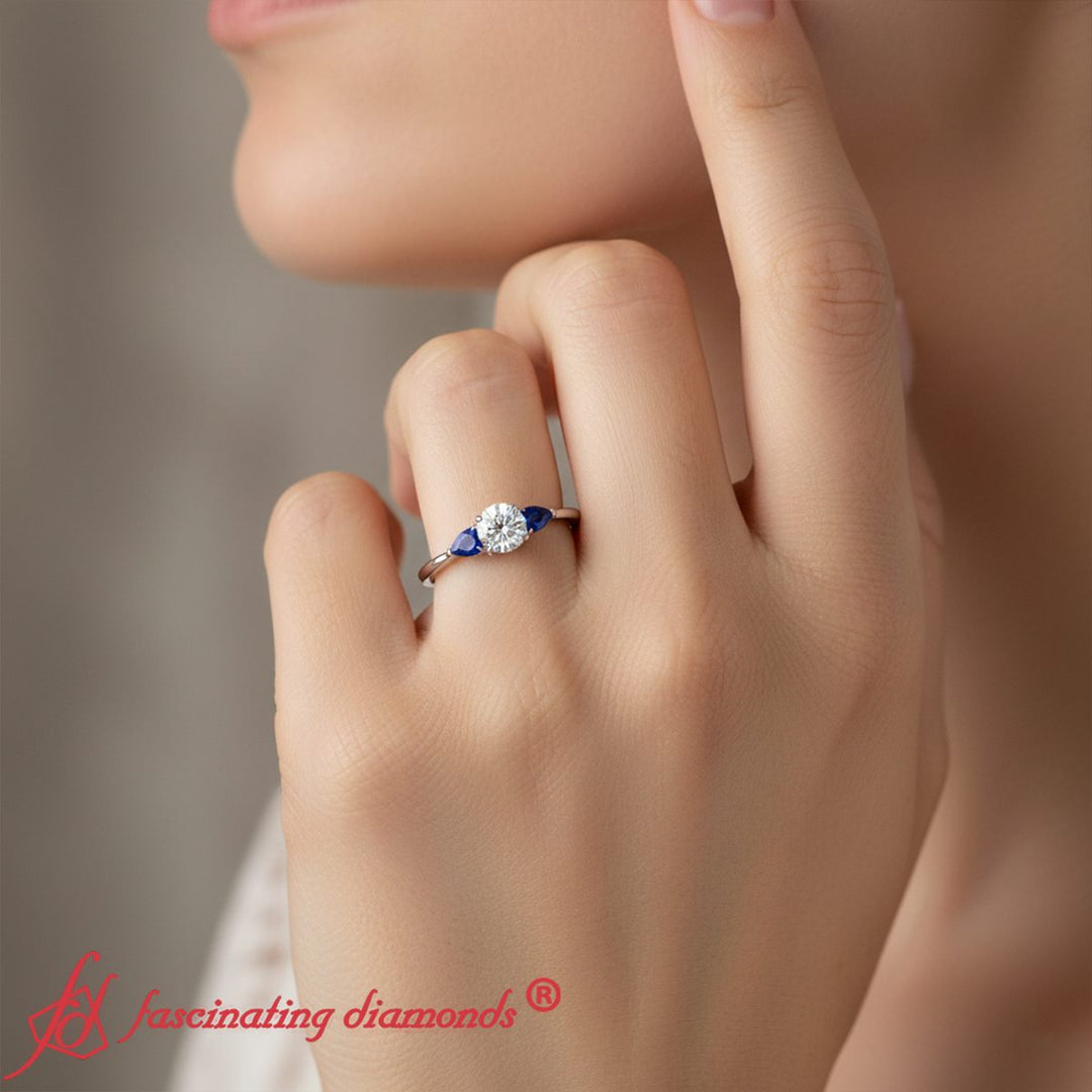 round-cut-pear-3-stone-cathedral-ring-white-gold-fdenr9210-model_1