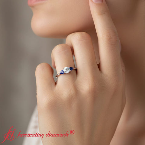 round-cut-pear-3-stone-cathedral-ring-white-gold-fdenr9210-model_1