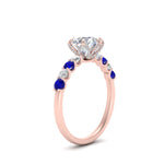 Load image into Gallery viewer, round-cut-prong-studded-sapphire-accented-solitaire-engagement-ring-in-FD10955RORGSABLANGLE3-NL-RG
