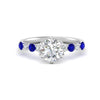 Load image into Gallery viewer, round-cut-prong-studded-sapphire-accented-solitaire-engagement-ring-in-FD10955RORGSABLANGLE3-NL-WG