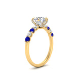 Load image into Gallery viewer, round-cut-prong-studded-sapphire-accented-solitaire-engagement-ring-in-FD10955RORGSABLANGLE3-NL-YG
