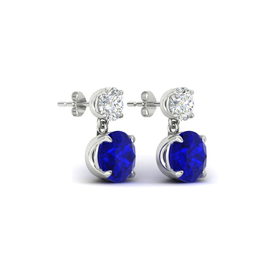 round-cut-sapphire-stud-earrings-with-drop-design-in-white-gold-fdear11550rogsablangle4-nl-wg.jpg?v=1769066477