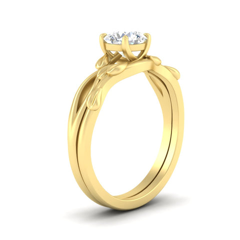 round-cut-solitaire-ring-with-vine-leaf-band-in-yellow-gold-fdens11688roangle2-nl-yg.jpg?v=1777023453