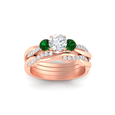round-cut-three-stone-twisted-emerald-wedding-band-in-rose-gold-fdens3301rogemgrangle5-nl-rg.jpg