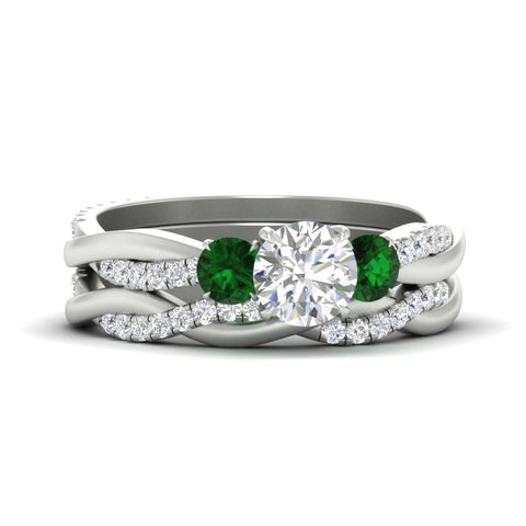 round-cut-three-stone-twisted-emerald-wedding-band-in-white-gold-fdens3301rogemgrsleep-nl-wg.jpg