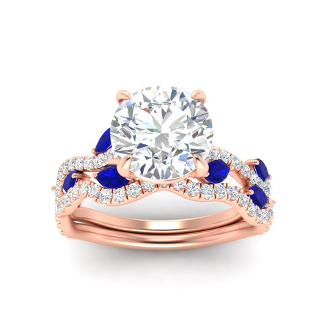 round-cut-twisted-curved-shank-sapphire-bridal-set-in-rose-gold-fdens11656rogsablangle5-nl-rg.jpg
