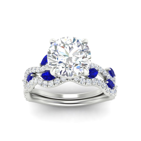 round-cut-twisted-curved-shank-sapphire-bridal-set-in-white-gold-fdens11656rogsablangle5-nl-wg.jpg