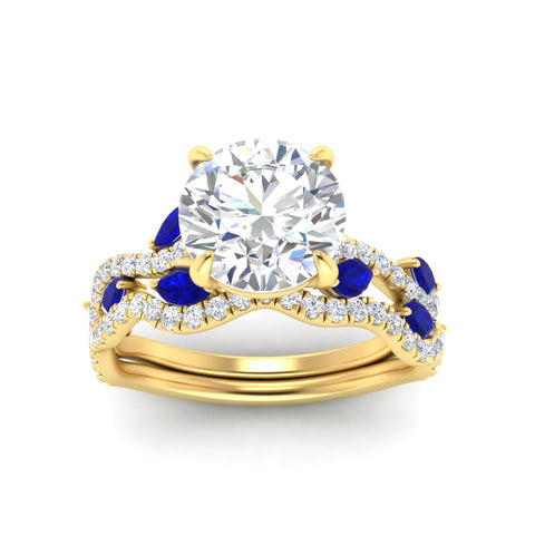 round-cut-twisted-curved-shank-sapphire-bridal-set-in-yellow-gold-fdens11656rogsablangle5-nl-yg.jpg