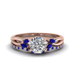 Load image into Gallery viewer, round-cut-twisted-diamond-bridal-set-with-blue-sapphire-in-14K-rose-gold-FD8300ROGSABL-NL-RG.jpg
