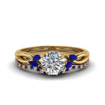Load image into Gallery viewer, round-cut-twisted-diamond-bridal-set-with-blue-sapphire-in-14K-yellow-gold-FD8300ROGSABL-NL-YG.jpg
