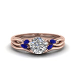 Load image into Gallery viewer, round-cut-twisted-diamond-ring-with-matching-curved-band-with-blue-sapphire-in-14K-rose-gold-FD8300ROGSABL-NL-RG.jpg
