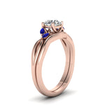 Load image into Gallery viewer, round-cut-twisted-diamond-ring-with-matching-curved-band-with-blue-sapphire-in-14K-rose-gold-FD8300ROGSABL-NL-RG.jpg
